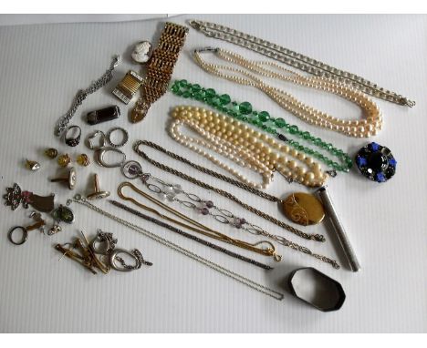 An assortment of silver chains with charms, mixed costume jewellery to include a 1950's Pygmalion-style powder compact, a sil