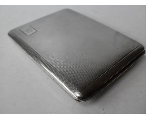 A George V silver cigarette case with engine turned design, monogrammed, inscription to inside by W T Toghill & Co, Birmingha