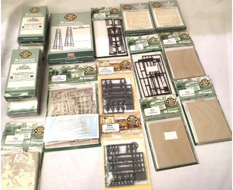 Sixteen ratio accessory/builder packs, sheeting, trestles, gutters/downpipes, fencing etc, new in packets. P&amp;P Group 1 (£