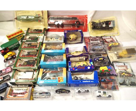 Over thirty assorted diecast vehicles; Corgi/Stobart, Maisto, Lledo toy fair special editions, Brumm etc and two replica tinp