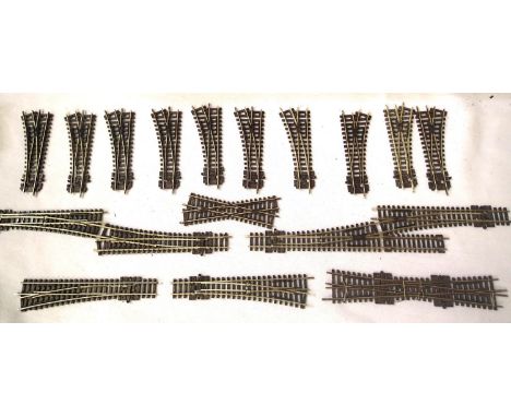 Eighteen N gauge Peco points (4 jointed in pairs) includes double slip, crossover etc. P&P Group 1 (£14+VAT for the first lot