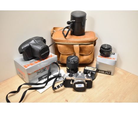 A Pentax SME Super camera body N3107253 with SMC Pentax-A 1:1,7 50mm lens, Prinzflex Auto Zoom 1:3,5-4,5 35-70mm lens a Penta