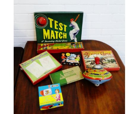 A carton containing a collection of vintage games to include Steeple Chase, Test Match Cricket, etc., together with a tin pla
