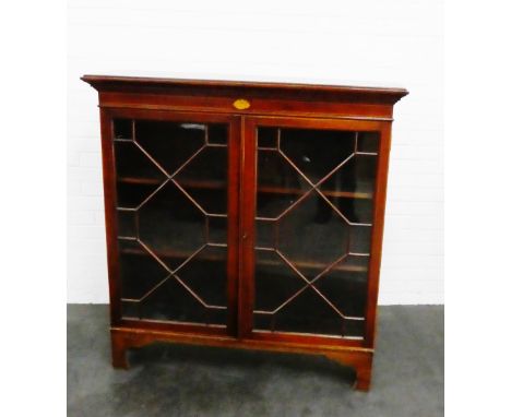 Mahogany and inlaid bookcase, with glazed doors and bracket feet, 128 x 121cm 