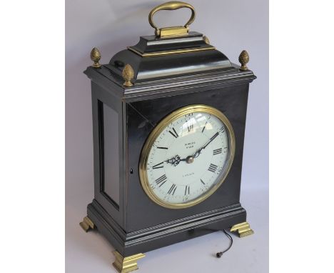 A George III ebonised cased bracket clock by 'Robert Ward, Abchurch Lane, London'; the pagoda-style top with brass handle and