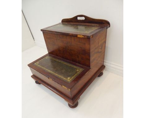 A set of mahogany and crossbanded library steps; both steps with inset gilt-tooled leather and the upper step hinged(49.5cm w