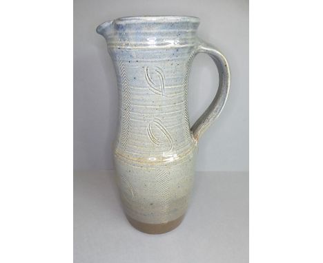 Ray Finch (British, 1914-2012) studio pottery - a reglazed jug with applied handle and incised decoration, Winchcombe Pottery