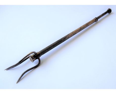 A silver pickle fork, the three prongs to the engine-turned shaft and push release mechanism, Birmingham 1959 (length 14cm)
