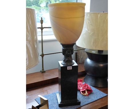 Maitland Smith Lighting; a marblised satin glass table torchère, a black marble base (68cm high x 24cm shade diameter)