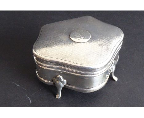 A hallmarked silver jewellery/trinket box; serpentine-fronted, lined with blue velvet and raised on four shaped legs, assayed