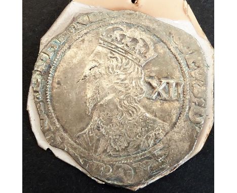 A Charles I English Civil War shilling with associated paperwork from the Tower Mint Ltd, Greenwich High Road, London and pap