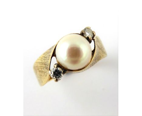 A 14-carat gold pearl and diamond ring