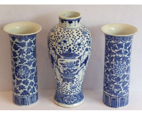 A pair of 19th century Chinese porcelain sleeve vases in Kangxi style; decorated in underglaze blue, the averted lip with a r