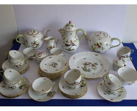 A fine and extensive selection of Herend porcelain: two 28cm dinner plates, two bullet-shaped teapots and a hot water jug, 12