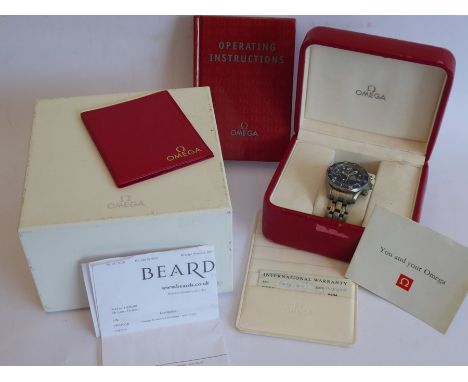 A gentleman's large and heavy Omega Seamaster Professional Titanium Chronometer bracelet wristwatch; the signed dark blue dia