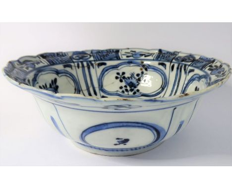 A Kangxi-period&nbsp;Chinese porcelain bowl; hand-decorated in underglaze blue, the interior with four quatrefoil panels surr