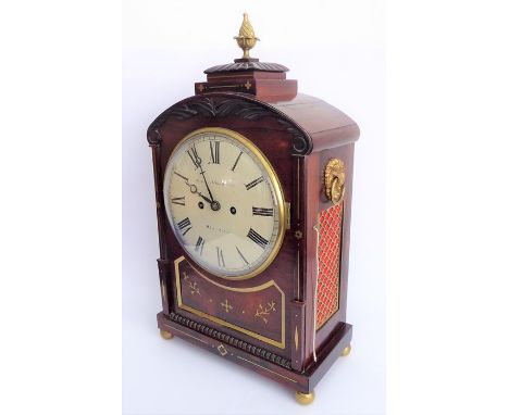 A good late Regency period rosewood cased and brass-inlaid eight-day bracket clock; the gilded pineapple finial on a pagoda-s