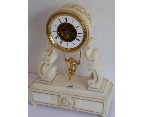 A 19th century white marble mantle clock; white-enamel chapter ring with Roman numerals and visible movement, the gilded Fren