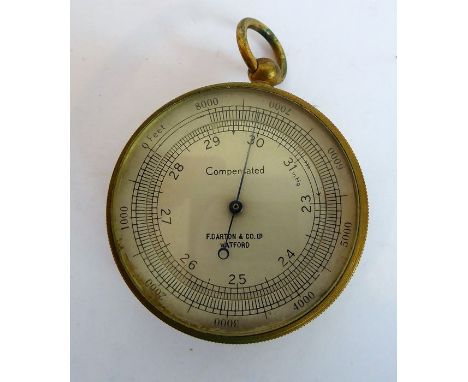 A late 19th/early 20th century handheld travelling barometer; the dial marked 'Compensated' and 'F. Daron &amp;Co Ltd. - Watf