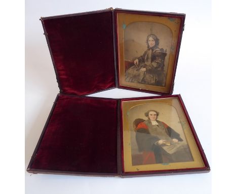 A cased pair of 19th century three-quarter length watercolour portrait miniature studies, a man of the cloth with long robes 