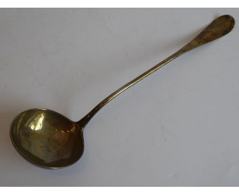 An 18th century Georgian silver ladle with engraved armorial (both armorial and hallmarks rubbed), possibly Edinburgh assay m