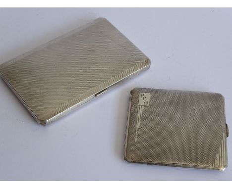 Two heavy early 20th century hallmarked silver cigarette cases: each with Birmingham assay marks and engine-turned decoration