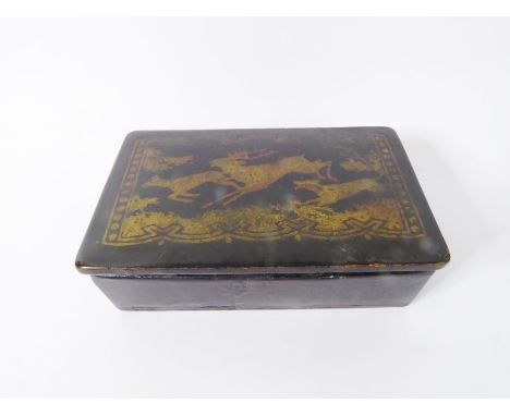 A late 19th century French papier-mâché snuff box; the hinged lid decorated with a deer hunting scene (7.5cm)