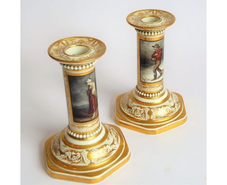 An interesting pair of Barr, Flight & Barr (Royal Porcelain Works, Worcester) porcelain candlesticks; each beautifully hand-g