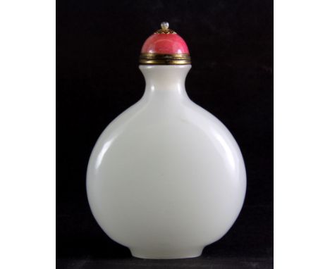 A Chinese white glass snuff bottle simulating white jade with a gilt and pink hardstone stopper, H. 9cm. Prov. Penny collecti