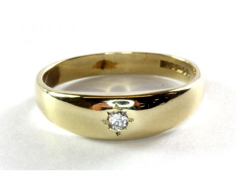 A 9ct yellow gold diamond set gypsy ring, (N).