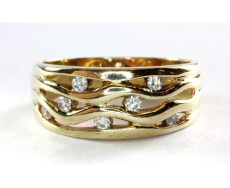 A 9ct yellow gold white stone set ring, (P). Approx. 3.8g