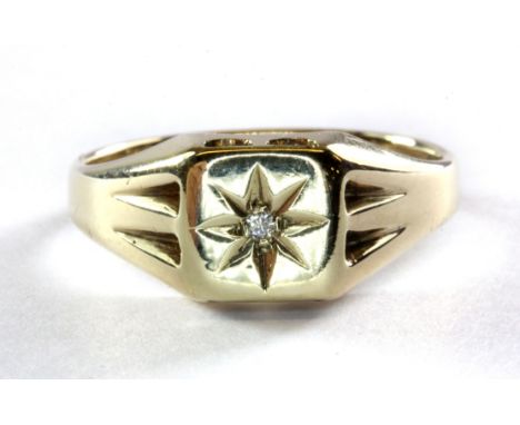 A gent's 9ct yellow gold diamond set signet ring, (R.5), approx. 3.3g.