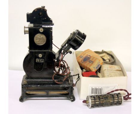 An early pathescope news reel projector, H. 32cm, together with a quantity of original pathescope films c.1933.