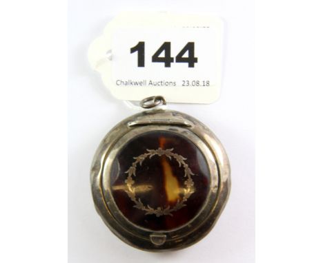 A hallmarked silver and tortoise shell compact, Dia. 5cm.
