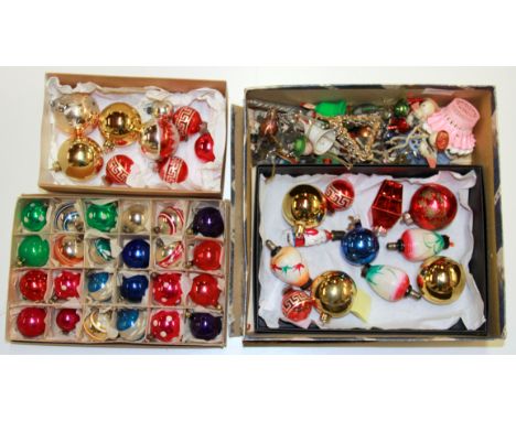 A quantity of vintage Christmas decorations.
