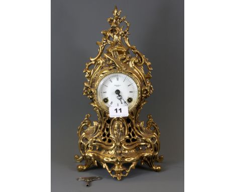 A gilt brass mantle clock, H. 34cm.