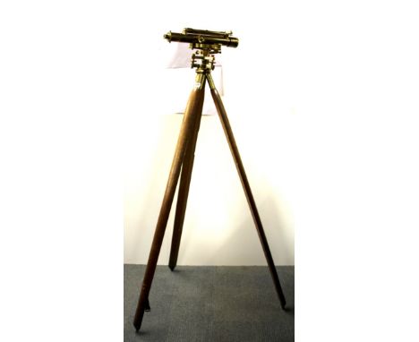 A large Stanley brass surveyors level and tripod, H. 159cm.