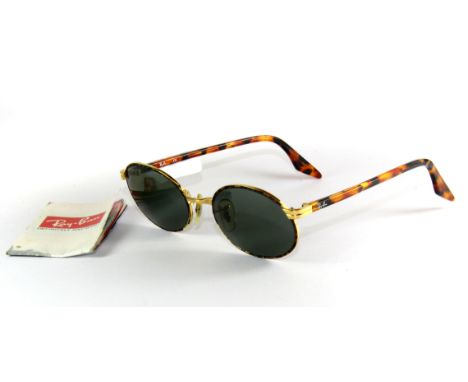 A pair of vintage Ray Ban sunglasses.
