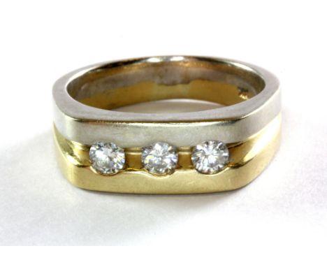 A gent's 14ct (stamped 14k) yellow and white gold three diamond (Approx. 0.6ct) set ring, (Y.5), approx. 13.2g.