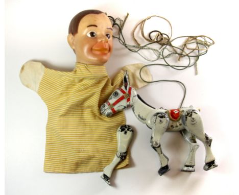 A 1960's rubber and cotton Archie Andrews puppet together with a metal Muffin the Mule.