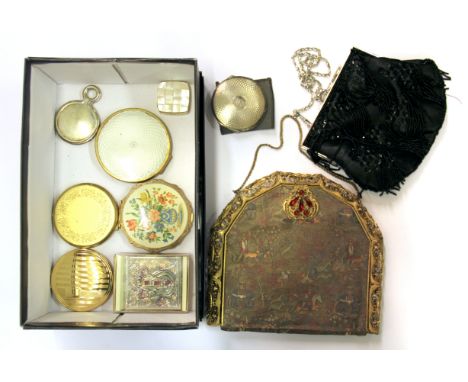 A silver compact, further compacts and hand bags.