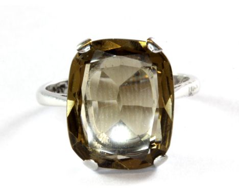 A 9ct white gold ring set with smokey quartz, (L).