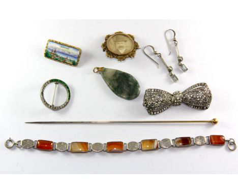 A 9ct gold topped hat pin and other items.