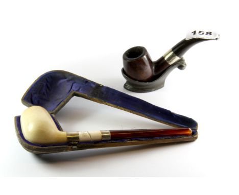 A silver mounted tobacco pipe and stand together with a cased silver mounted pipe (A/F).