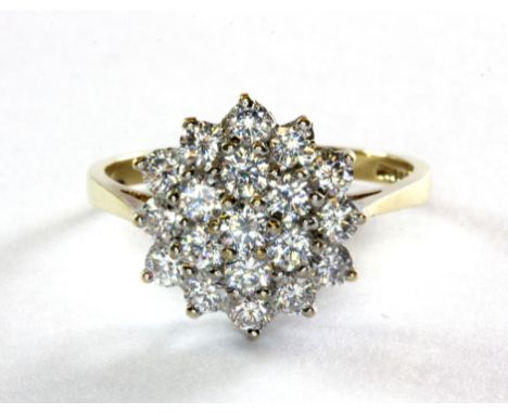 A 9ct yellow gold cubic zirconia set cluster ring, (Q).