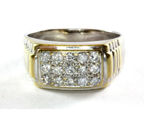 A gentleman's 18ct white gold (stamped 750) diamond set ring, (Z.5), approx. 13.4g.