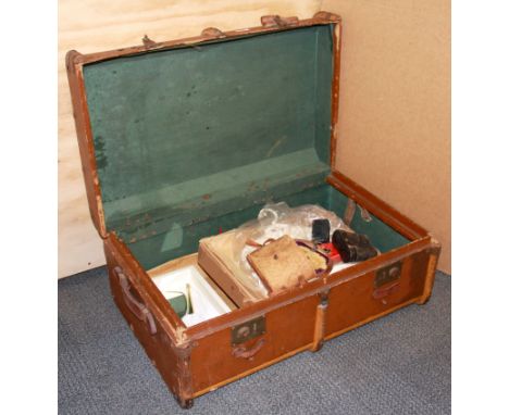 A cabin trunk and contents.