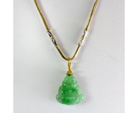 A heavy yellow and white metal necklace (tested 18ct) with a carved jade pendant of the happy Buddha, L. 44cm. Approx. 11.7g 