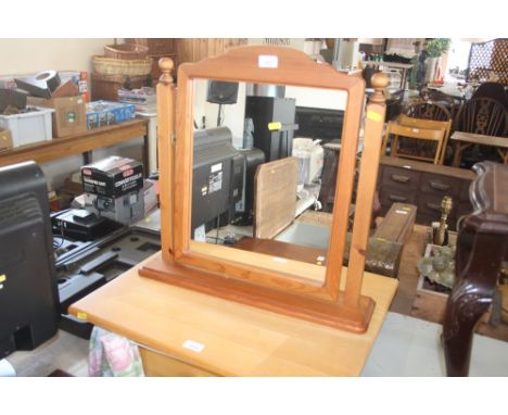 A modern pine swing frame dressing table mirror