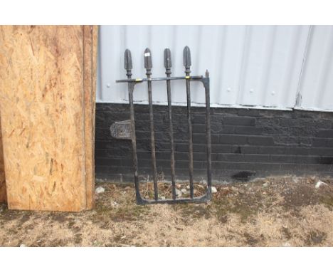 A Victorian cast iron gate 